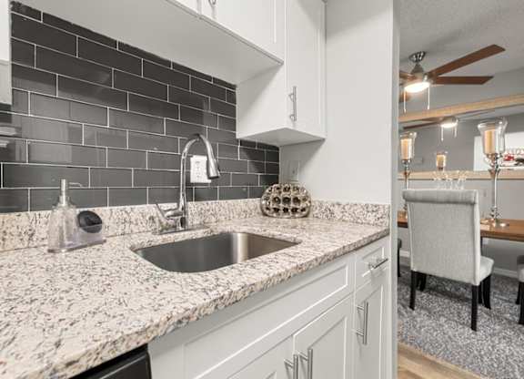 Model kitchen at Oasis at Bayside Apartments in Largo, FL