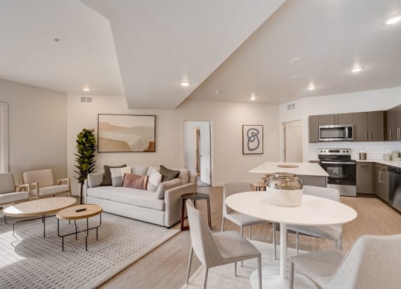 a living room with a couch and a table