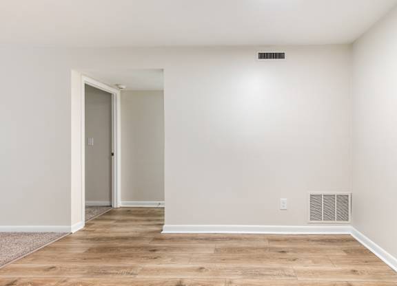 A room with a door and a window.