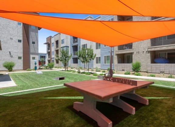 Outdoor covered ping pong table