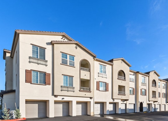 Apartment exterior showcasing resident garages
