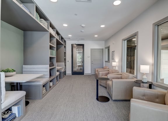 a room filled with furniture and a large window