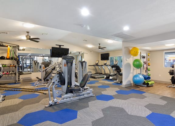 fitness room with exercise equipment