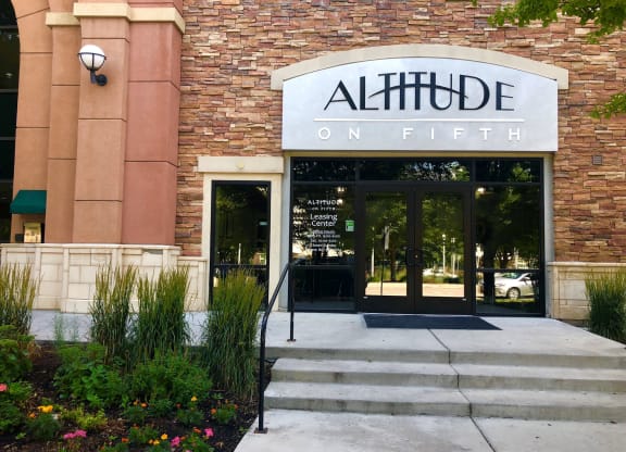Apartment building exteriors and entrance sign