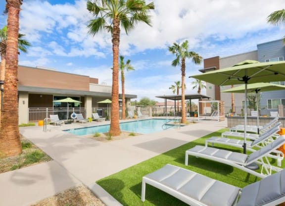 Lounge chairs with view of swimming pool