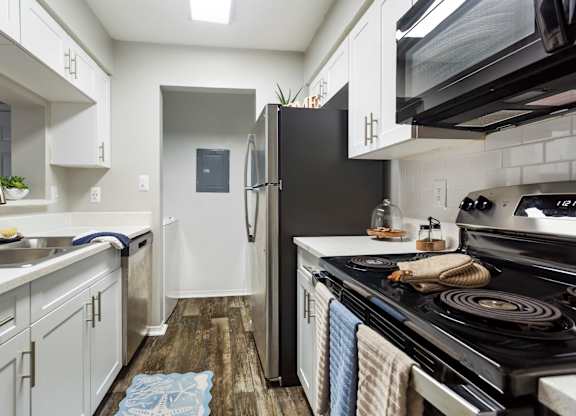Model kitchen at Caribbean Breeze Apartments in Tampa, FL.