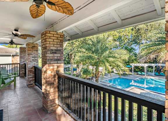 Balcony overlooking pool and sundeck