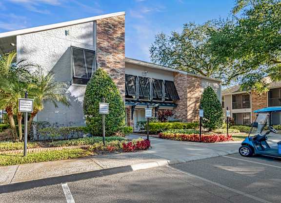 Leasing office exterior at Grand Pavilion Apartments in Tampa, FL