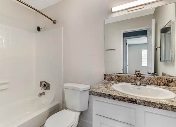 Model bathroom with modern fixtures at Park at 7200 in Jacksonville, Florida.