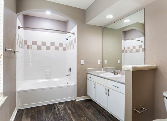 Model bathroom with white vanity at Veranda at Westchase in Tampa, Florida.