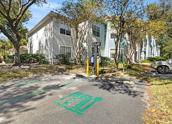 Community building and parking lot at Vinings at Hunters Green in Tampa, Florida.