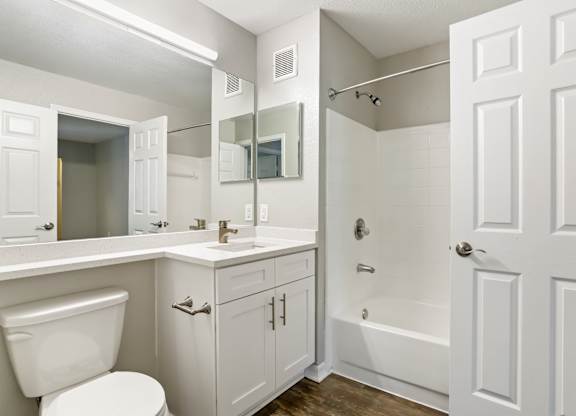 Model bathroom with white vanity at Hunters Green in Tampa, Florida.