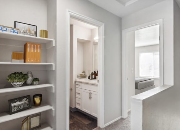 Model bathroom with a sink and a mirror