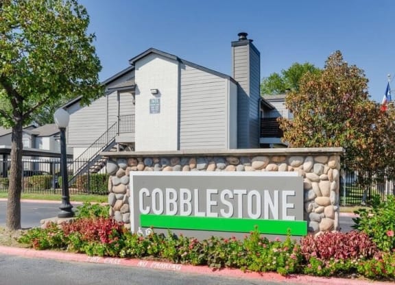 Property entrance sign  at Cobblestone, Texas