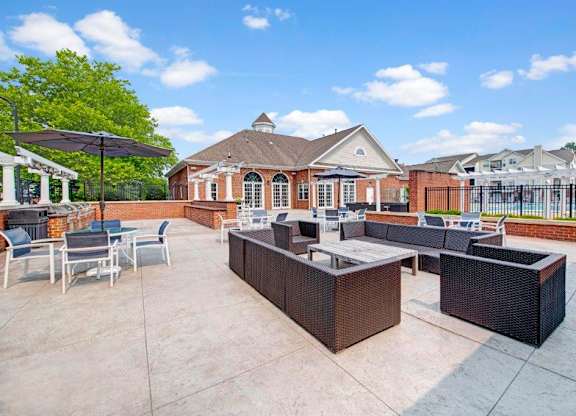 Outdoor lounge space at Dulles Green Apartments in Herndon, Virginia