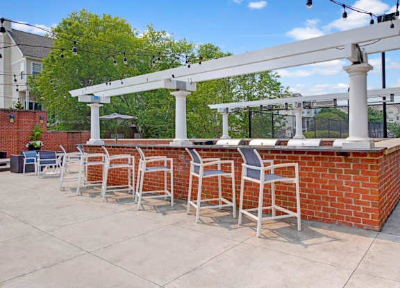 Outdoor kitchen area at Dulles Green Apartments in Herndon, Virginia