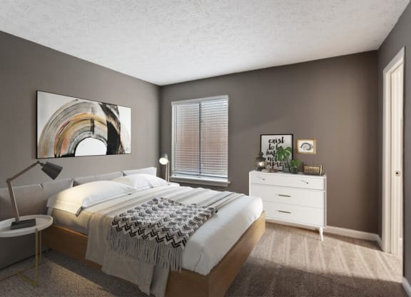 Norcross, GA Pet-Friendly Apartments - Elevate at Jackson Creek - Bedroom With White Upholstered Bed, Matching Nightstands, and Plush Carpeting