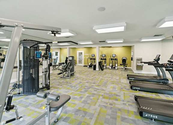 Community Fitness Center with Equipment at The Club Apartments located in Hillsboro, OR.