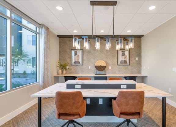 Business center workstations at Glen 91 Apartments in Glendale, AZ