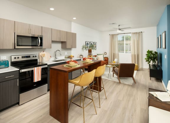a kitchen and dining area in a 555 waverly unit