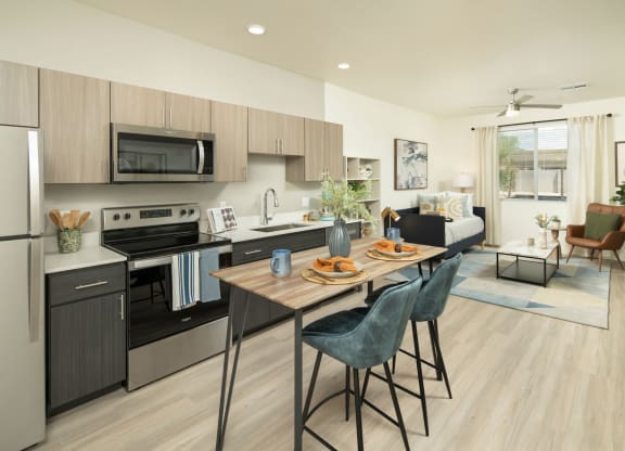 a kitchen and living room in a 555 waverly unit