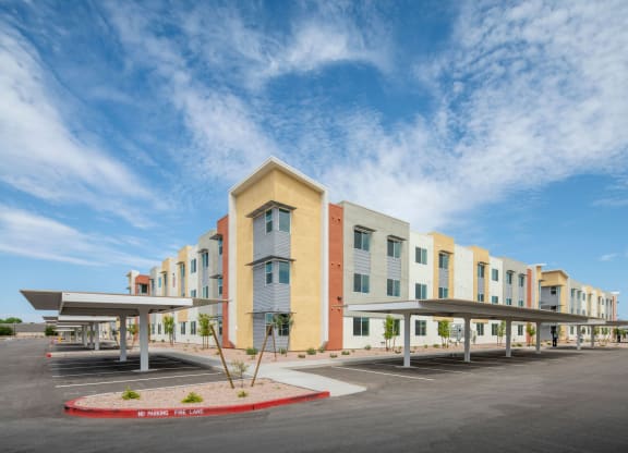 a building with a parking lot in front of it