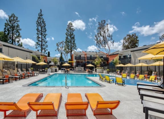 Pool deck with loungers at Horizon Apartments in Santa Ana, California