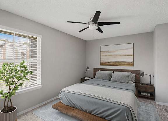 Model Bedroom with Carpet and Window View at Abbington Heights Apartments in Antioch, TN.