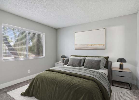 an empty bedroom with a bed and a window