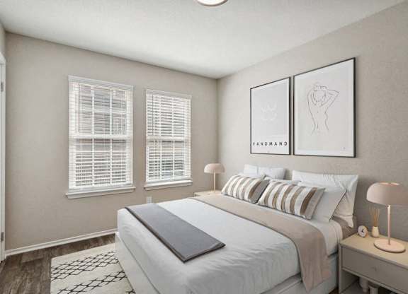 a bedroom with a bed and three windows