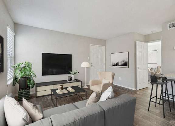 a living room with a couch and a television
