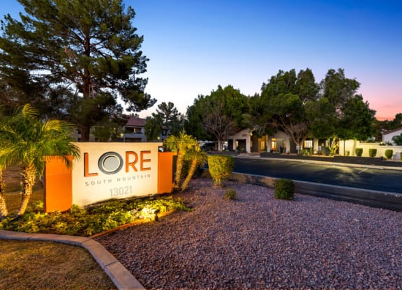 a sign that says love town homes on the side of a road at Lore South Mountain, Phoenix, 85044