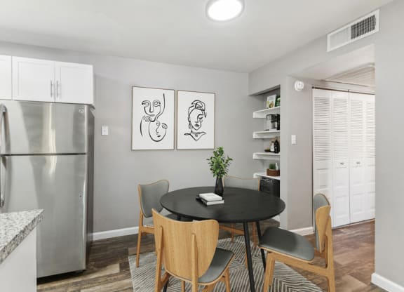 Model apartment dining room and kitchen at Lore South Mountain, Arizona, 85044