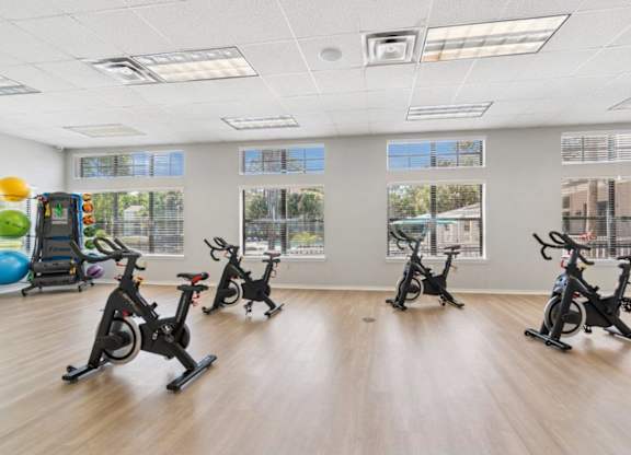 Fitness center with stationary bikes at Mirage on Kernan Apartments in Jacksonville, FL