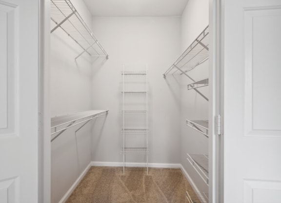 a walk in closet in a 555 waverly unit