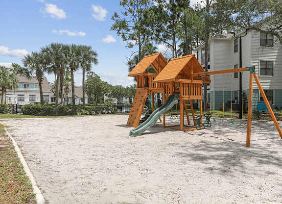 Community Playground with Slide and Swing Set at Mirage on Kernan Apartments located in Jacksonville, FL.