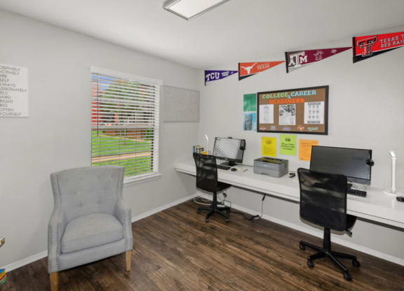 Community resource center with a chair and a desk computers