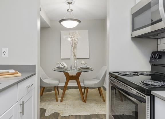Model kitchen with view of dining area