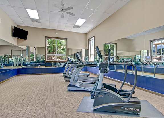 Community Fitness Center with Equipment at Ridge & Shores Apartments located in Federal Way, WA.