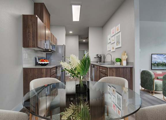 A modern kitchen with a glass table and chairs.