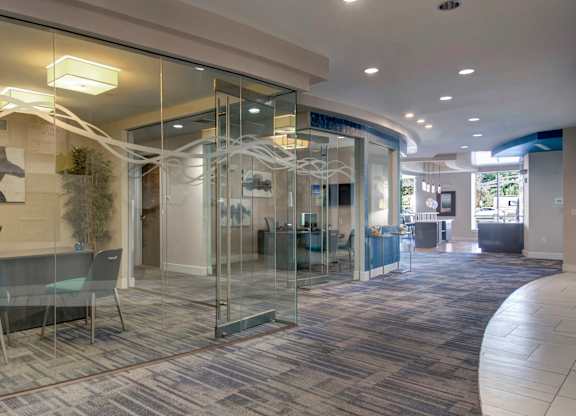 community center- A glass wall separates the office space from the meeting room.