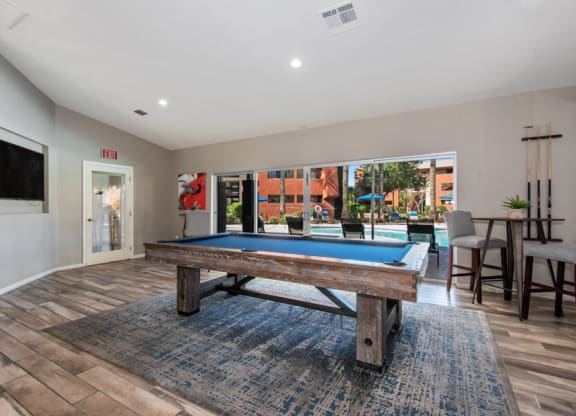 Community game room with pool table at Saratoga Ridge, Phoenix, Arizona