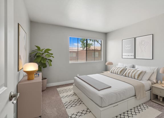 a bedroom with a bed and a window