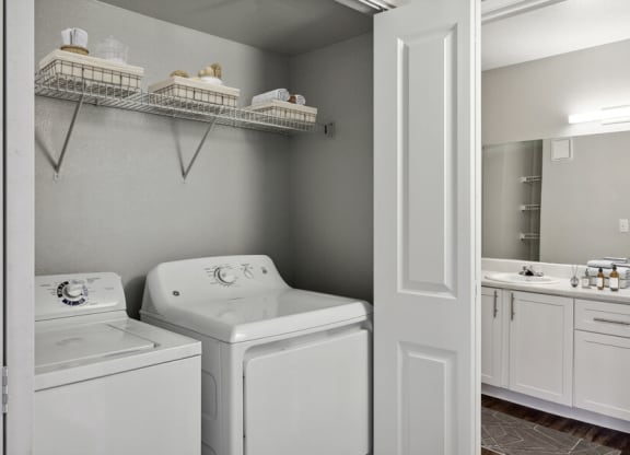 a white washer and dryer in a room