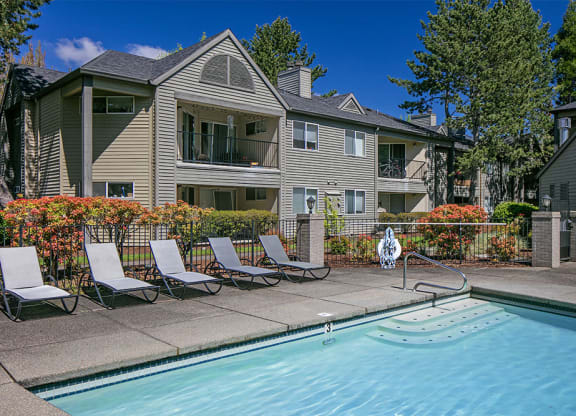 Poolside lounge chairs and cabanas
