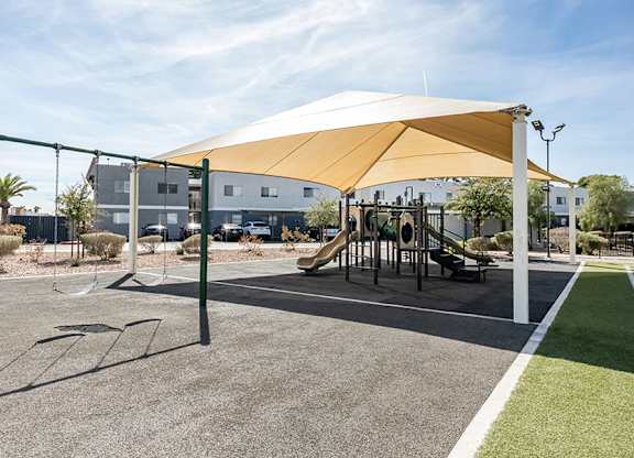 Community Playground at Bridges at Tropicana Apartments located in Las Vegas, Nevada.