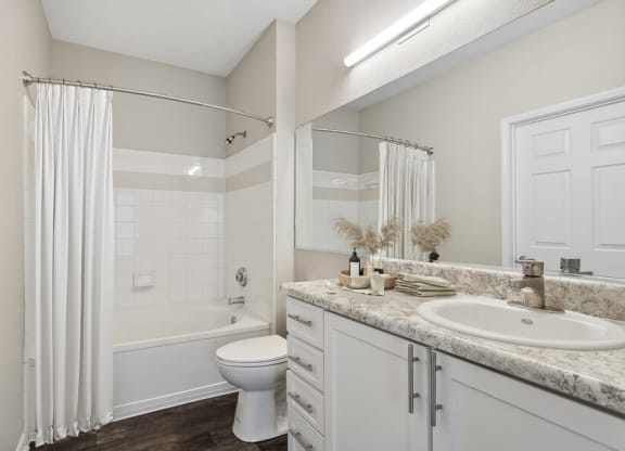 Bathroom with a shower toilet and sink