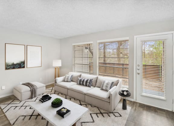 a living room with a couch and a coffee table