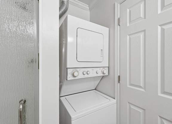 A white oven and stove in a kitchen.