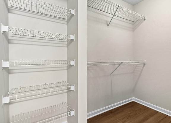 Walk-in closet with wire shelving system at The Courts at Fair Oaks Apartments, Virginia, 22030